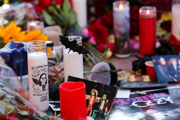 Flowers and pictures are placed on the star of late Ozzy Osbourne at the Hollywood Walk of Fame in Los Angeles