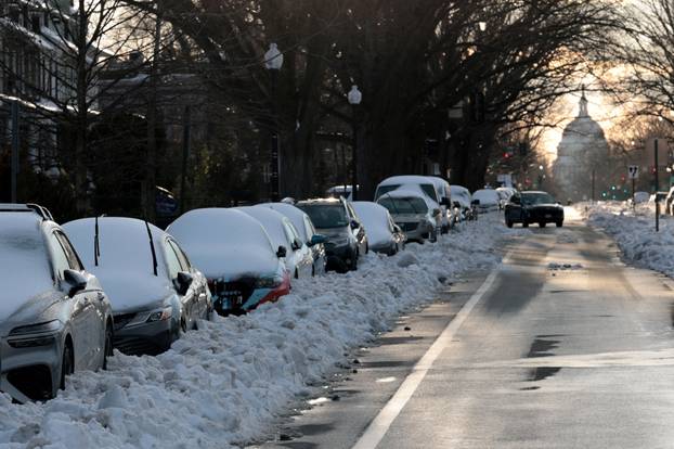 People deal with the aftermath of a major winter storm across a large swath of the United States