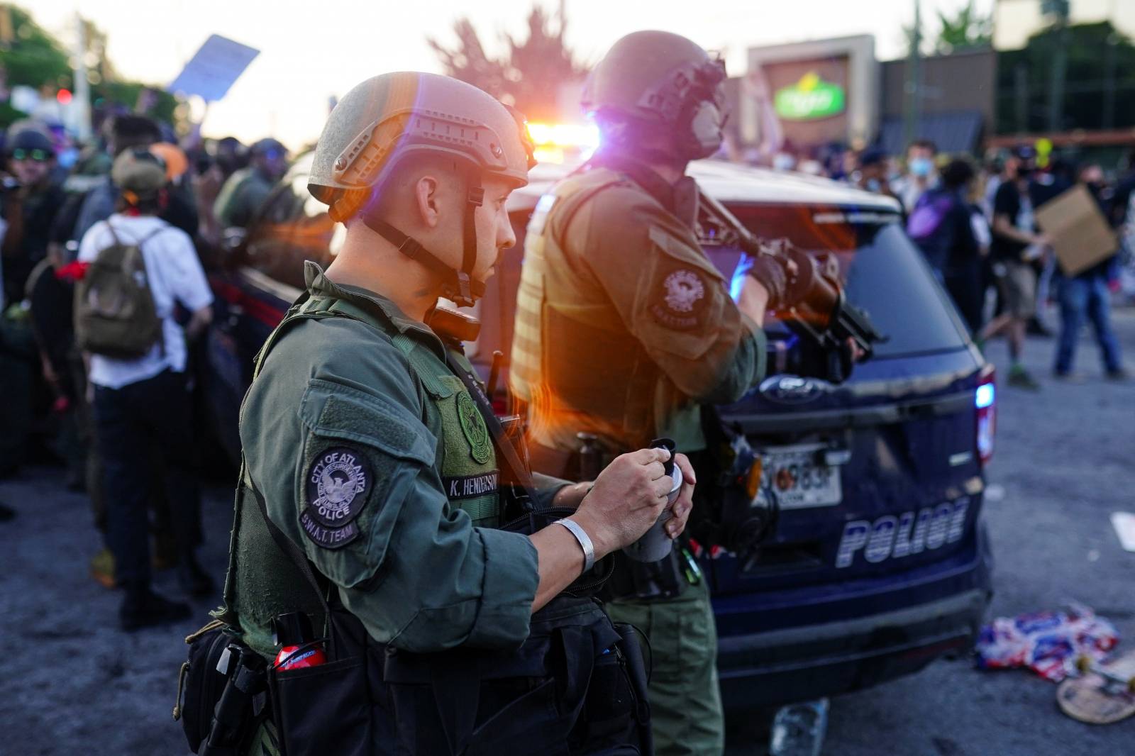 Atlanta SWAT officers are seen with weapons out during a rally against racial inequality and the police shooting death of Rayshard Brooks, in Atlanta