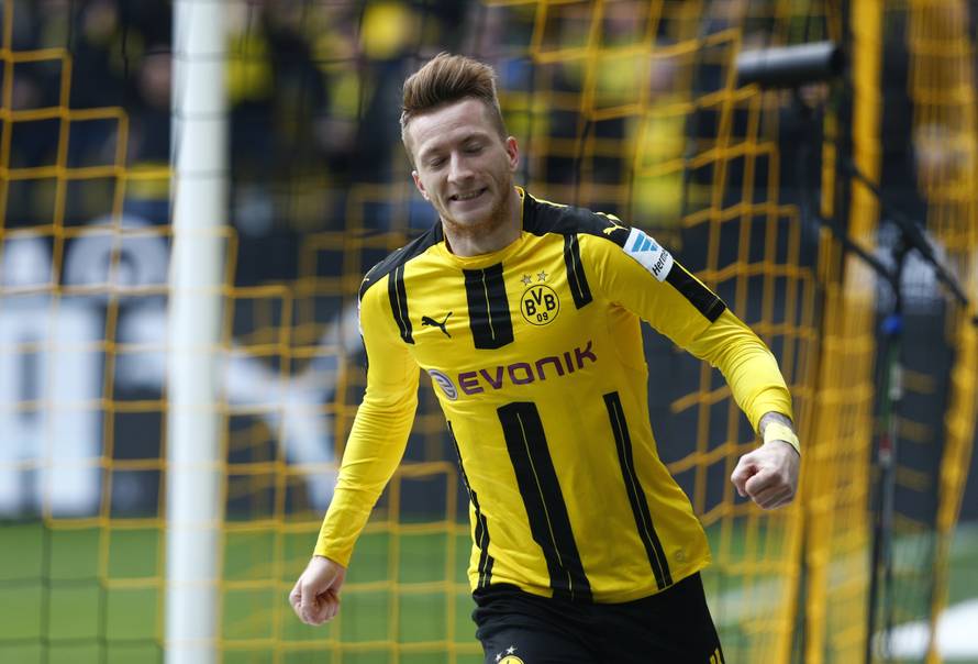 Borussia Dortmund's Marco Reus celebrates scoring their first goal