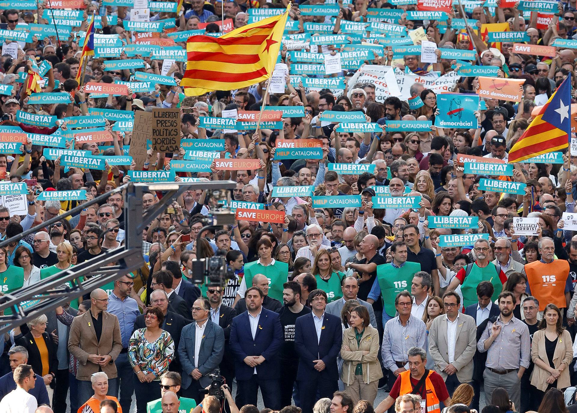 Catalan President Puigdemont and other government members attend a demonstration organised by Catalan pro-independence movements ANC (Catalan National Assembly) and Omnium Cutural, following the imprisonment of their two leaders in Barcelona