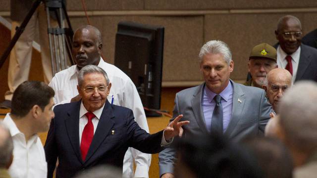 Cuba's President Raul Castro and First Vice-President Miguel Diaz-Canel arrive for a session of the National Assembly in Havana