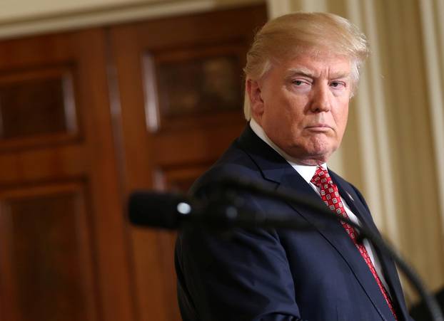 U.S. President Donald Trump looks at Japanese Prime Minister Shinzo Abe during a joint news conference at the White House in Washington, U.S.