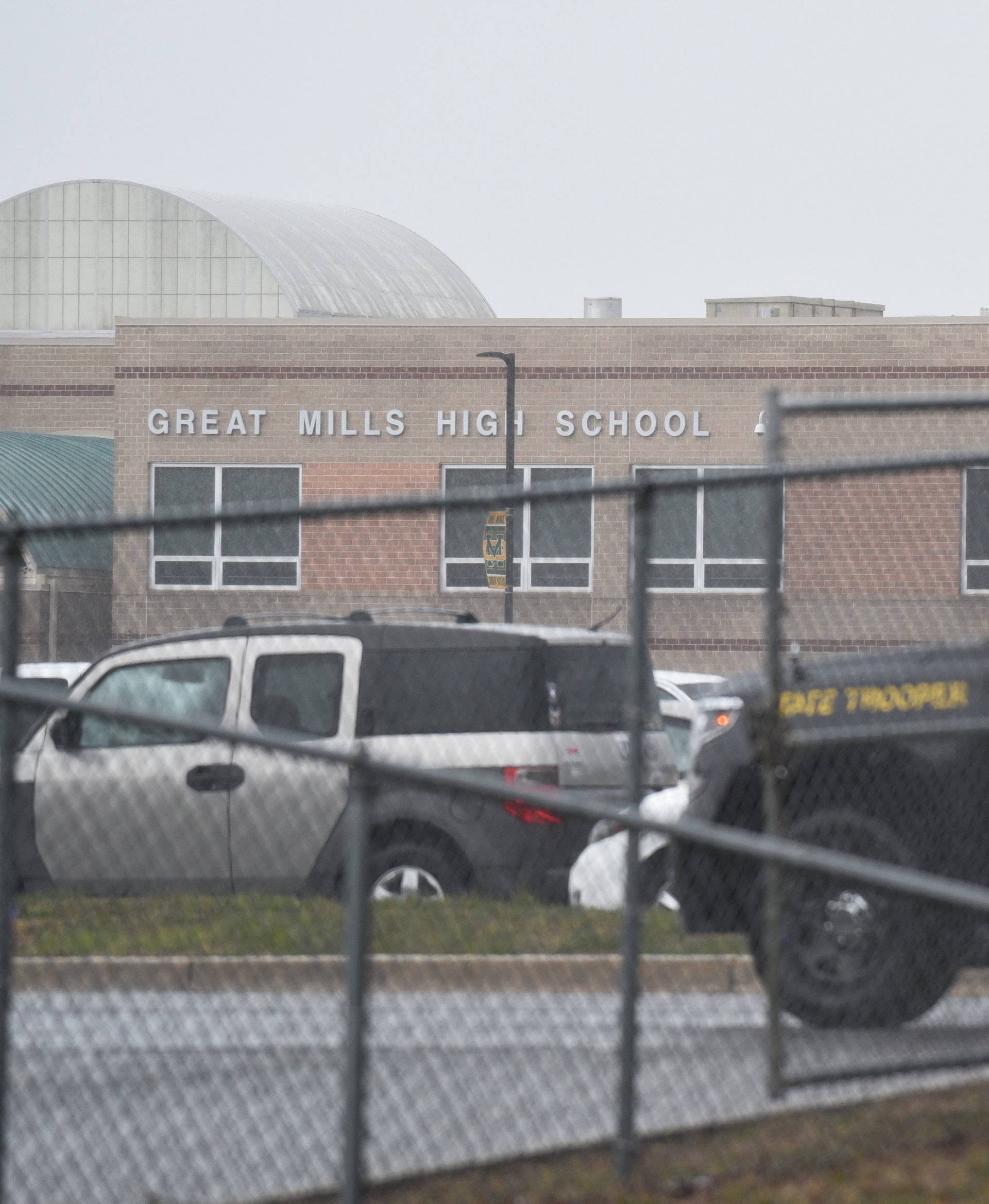 Emergency services and law enforcement vehicles are seen outside the Great Mills High School following a shooting on Tuesday morning in St. Mary's County, Maryland