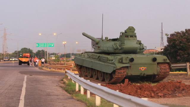 Military tank is seen along highway as part of military exercises, in Maracaibo