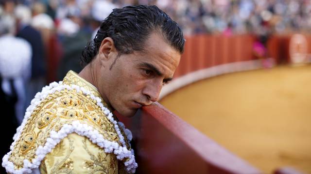 FILE PHOTO: Spanish matador Ivan Fandino leans his face on the barrier during a bullfight at the Maestranza bullring in the Andalusian capital of Seville