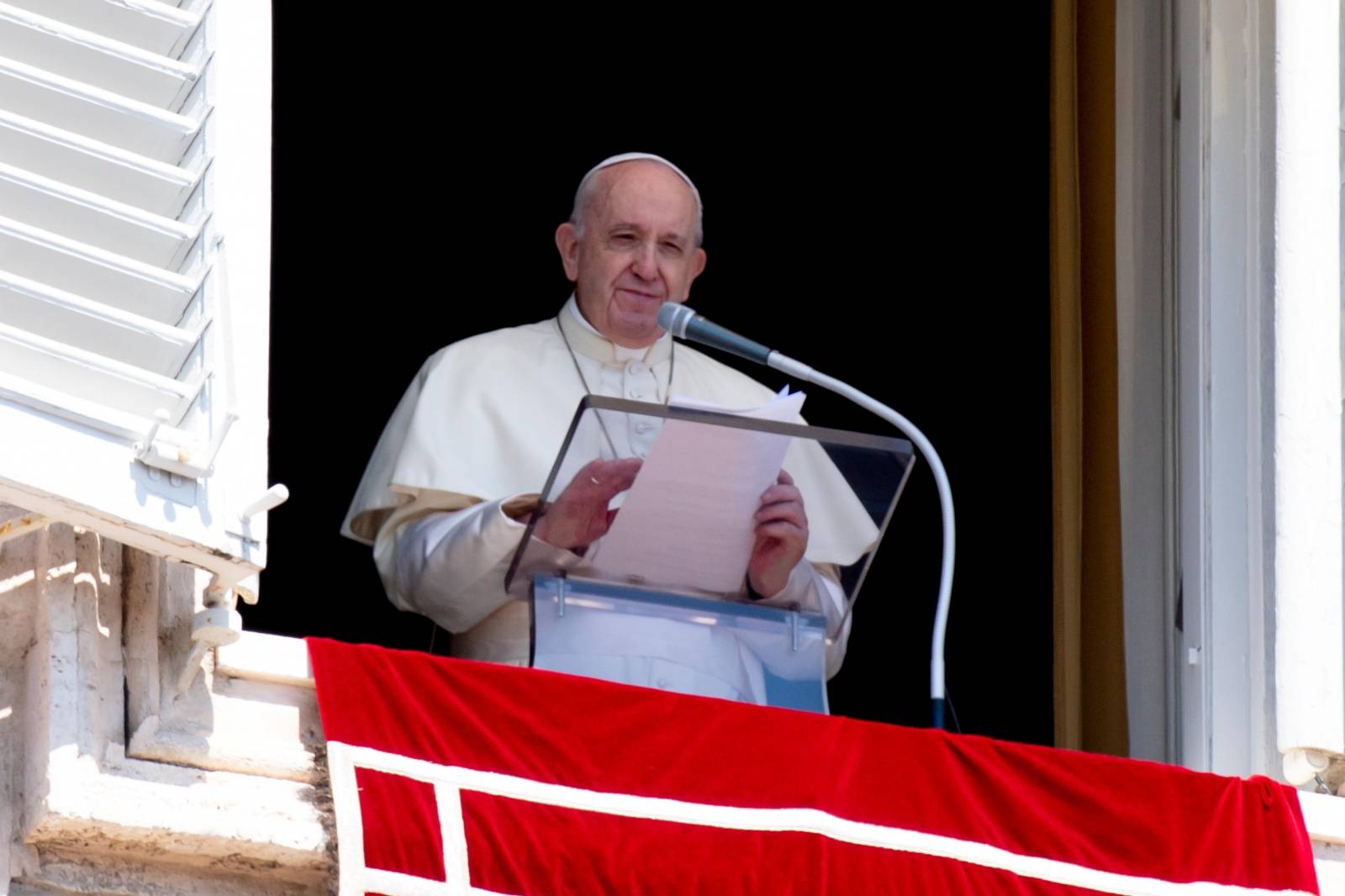 Pope Francis speaks during Angelus from the window at St Peter's Square, at the Vatican