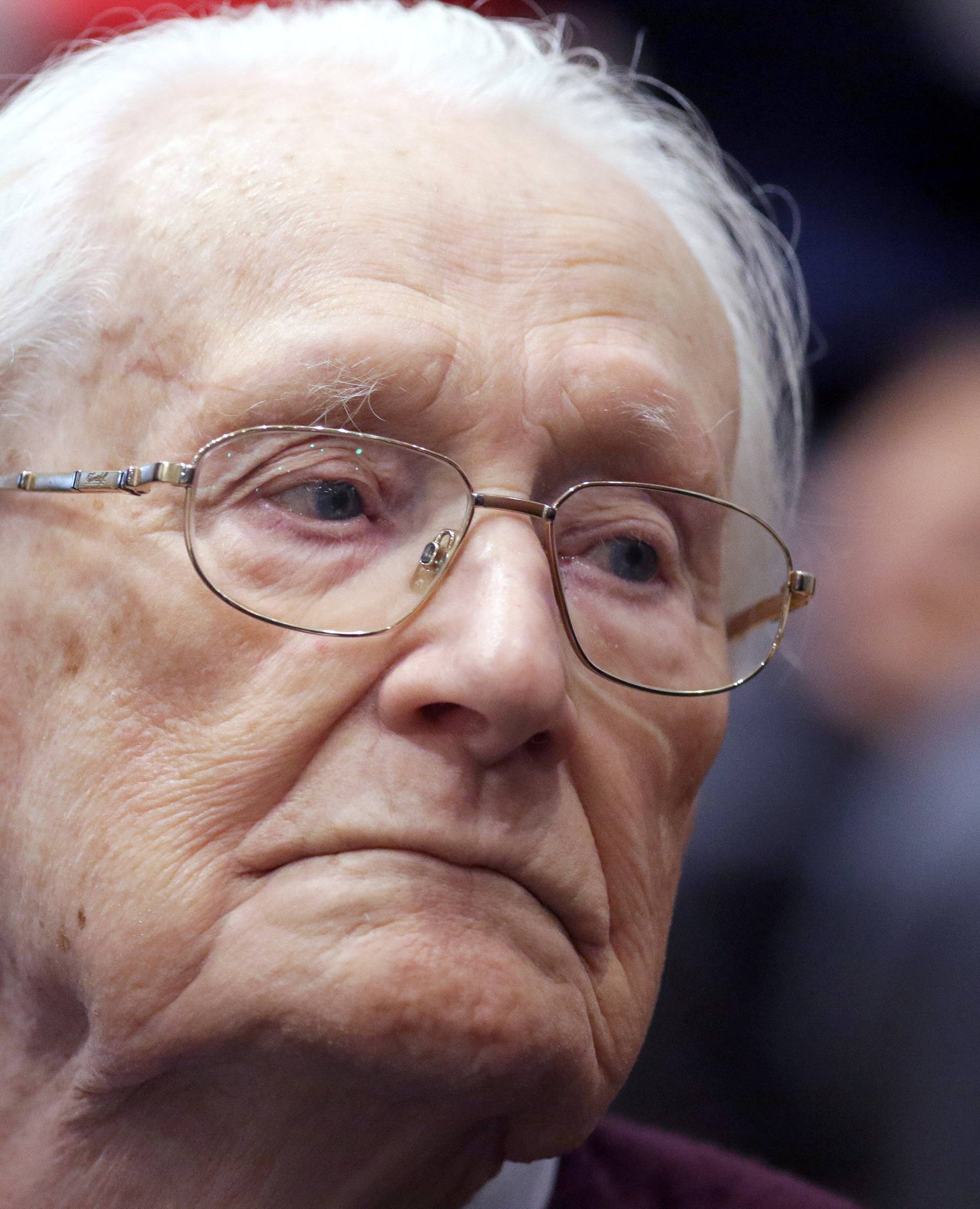 FILE PHOTO: Groening, defendant and former Nazi SS officer dubbed the "bookkeeper of Auschwitz", is pictured in the courtroom during his trial in Lueneburg