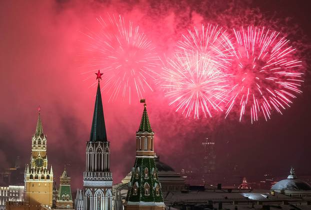 Fireworks explode in the sky over the Kremlin during New Year celebrations in Moscow