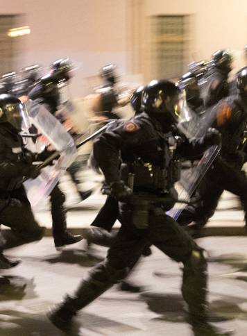 Serbia's police officers intervene to end standoff between ruling party supporters and anti-government protesters in Belgrade