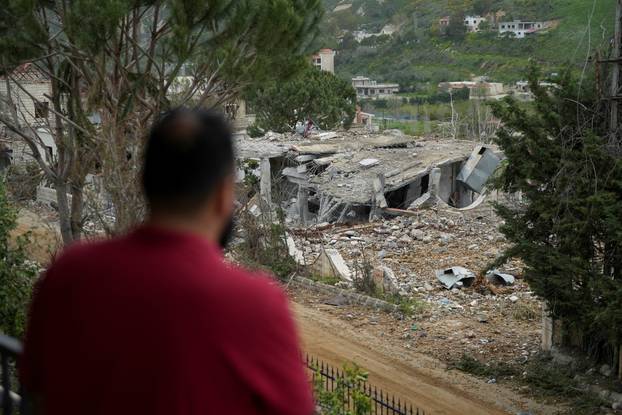 Scenes of destruction in the village of Debbine
