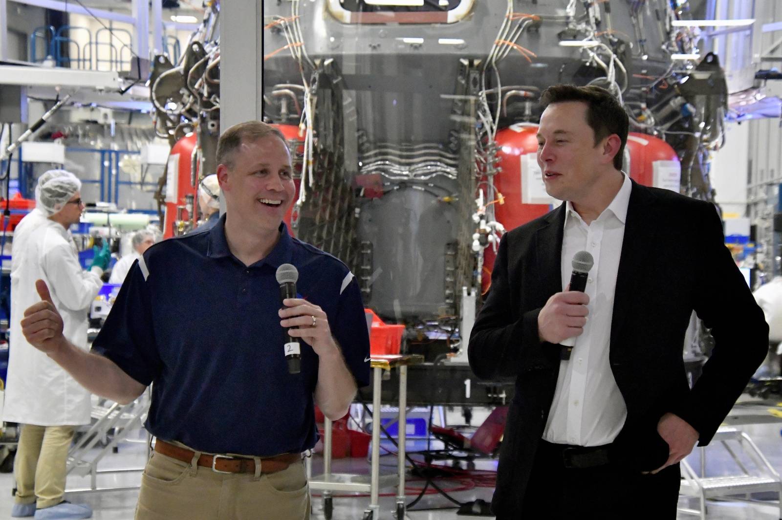 NASA Administrator Jim Bridenstine and SpaceX Chief Engineer Elon Musk talk to the press after a tour of  SpaceX headquarters in Hawthorne