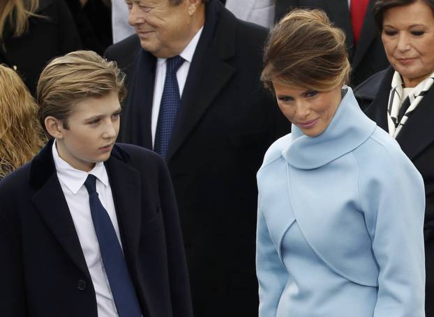 Incoming U.S. first lady Melania Trump and son Barron attend the presidential inauguration of President-elect Donald Trump at the U.S. Capitol in Washington