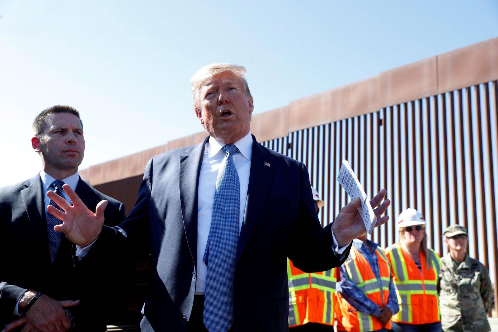 FILE PHOTO: U.S. President Trump visits a section of the U.S.-Mexico border wall in Otay Mesa