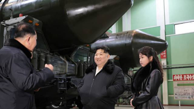 North Korean leader Kim Jong Un visits a military vehicle production plant