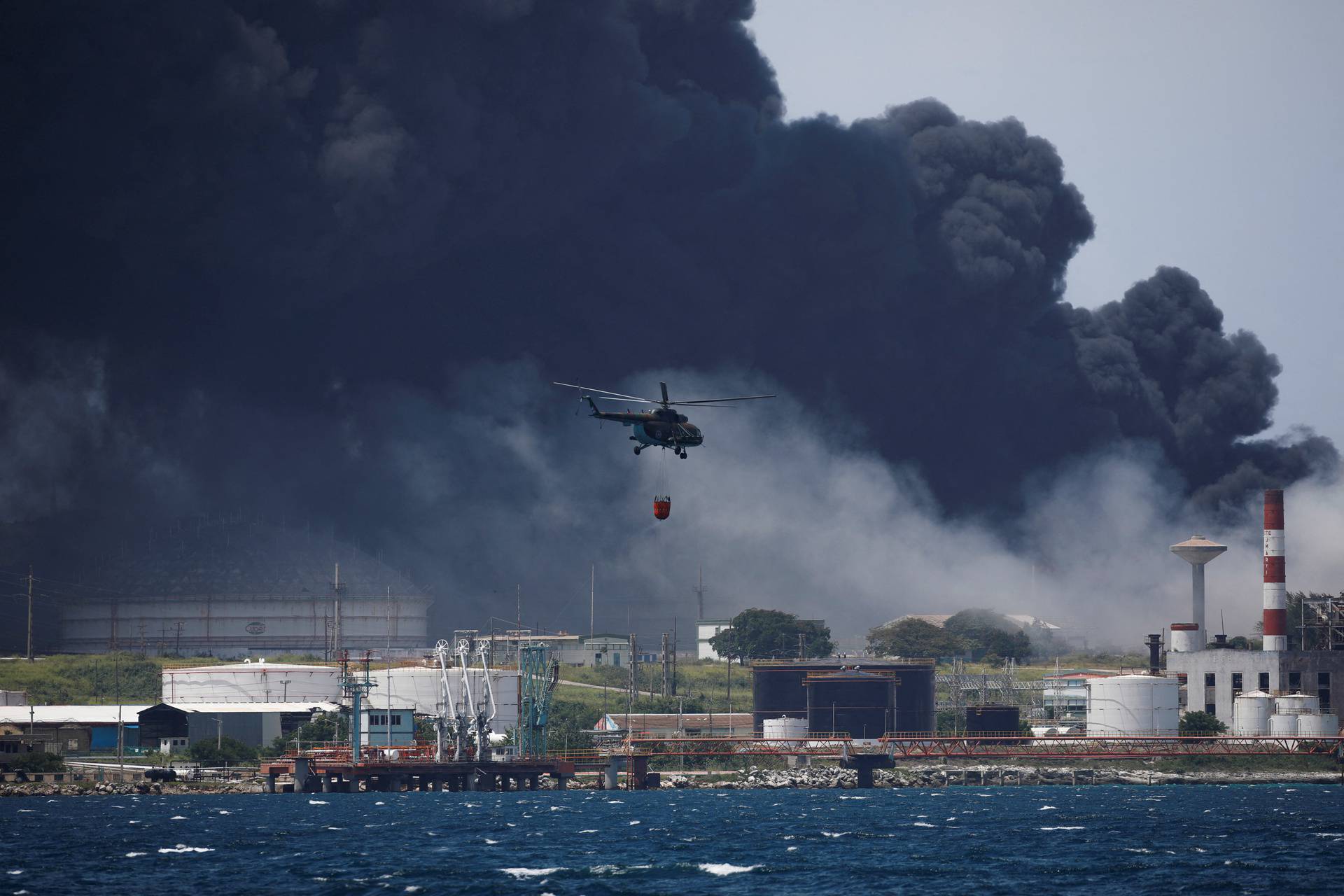 Major fire spreads at Cuban fuel storage facility hit by lightning