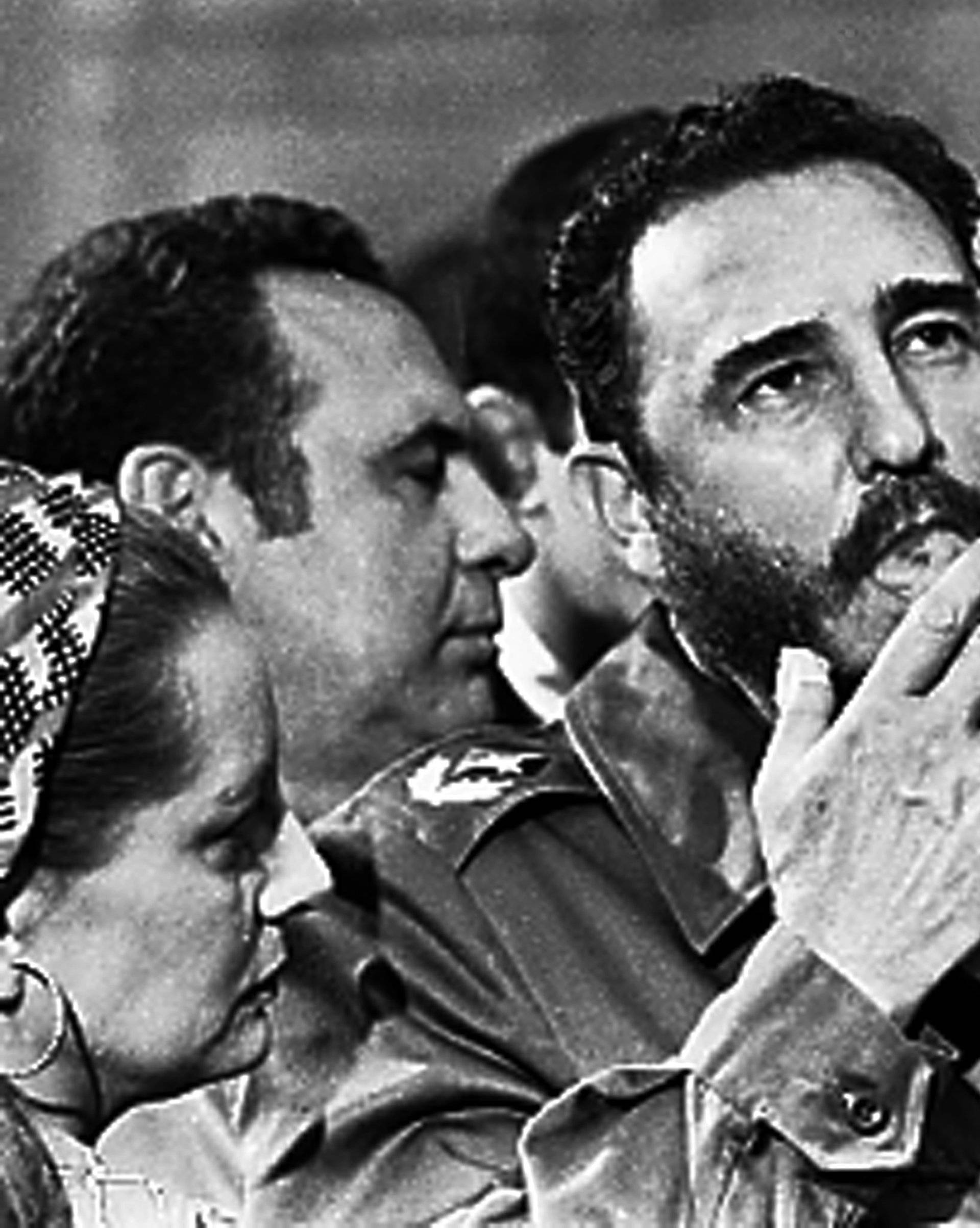 File photo of then Cuban Prime Minister Fidel Castro smoking a cigar during interviews with the press during a visit of U.S. Senator Charles McGovern, in Havana