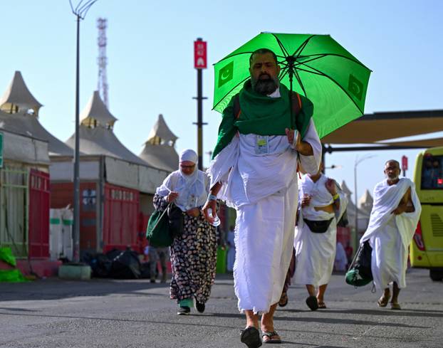 Muslims make their way to Mina during hajj pilgrimage from the holy city of Mecca, Saudi Arabia