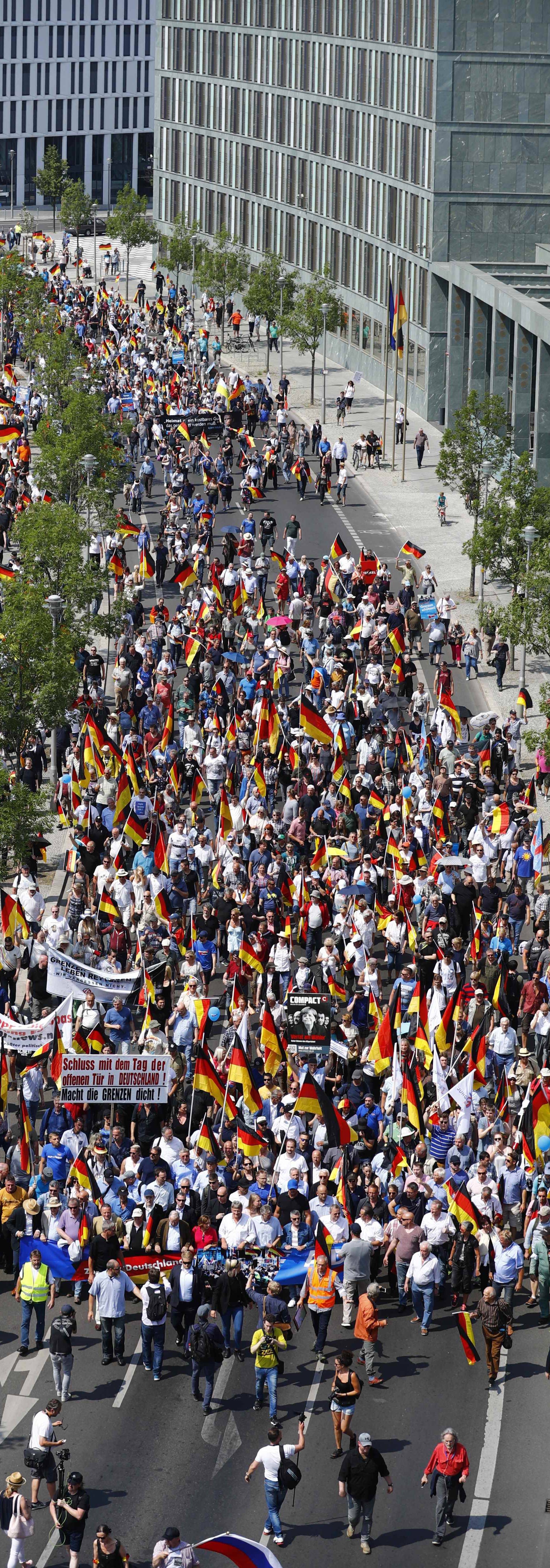 Supporters of the Anti-immigration party Alternative for Germany (AfD) hold a protest in Berlin