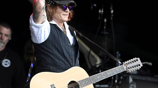 Actor Johnny Depp performs with musician Jeff Beck, in Helsinki