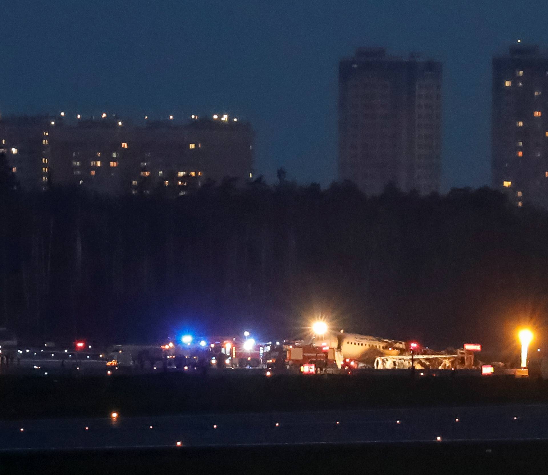 The wreckage of a passenger plane is seen after an emergency landing at the Sheremetyevo Airport outside Moscow