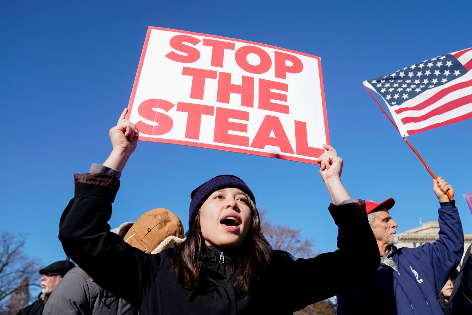 People participate in a "Stop the Steal" protest outside the U.S. Supreme Court in support of U.S. President Donald Trump in Washington