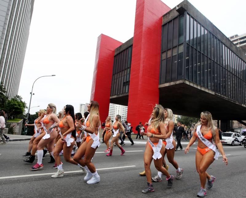 Miss BumBum Brazil 2016 pageant candidates parade at Paulista Avenue in Sao Paulo's financial centre