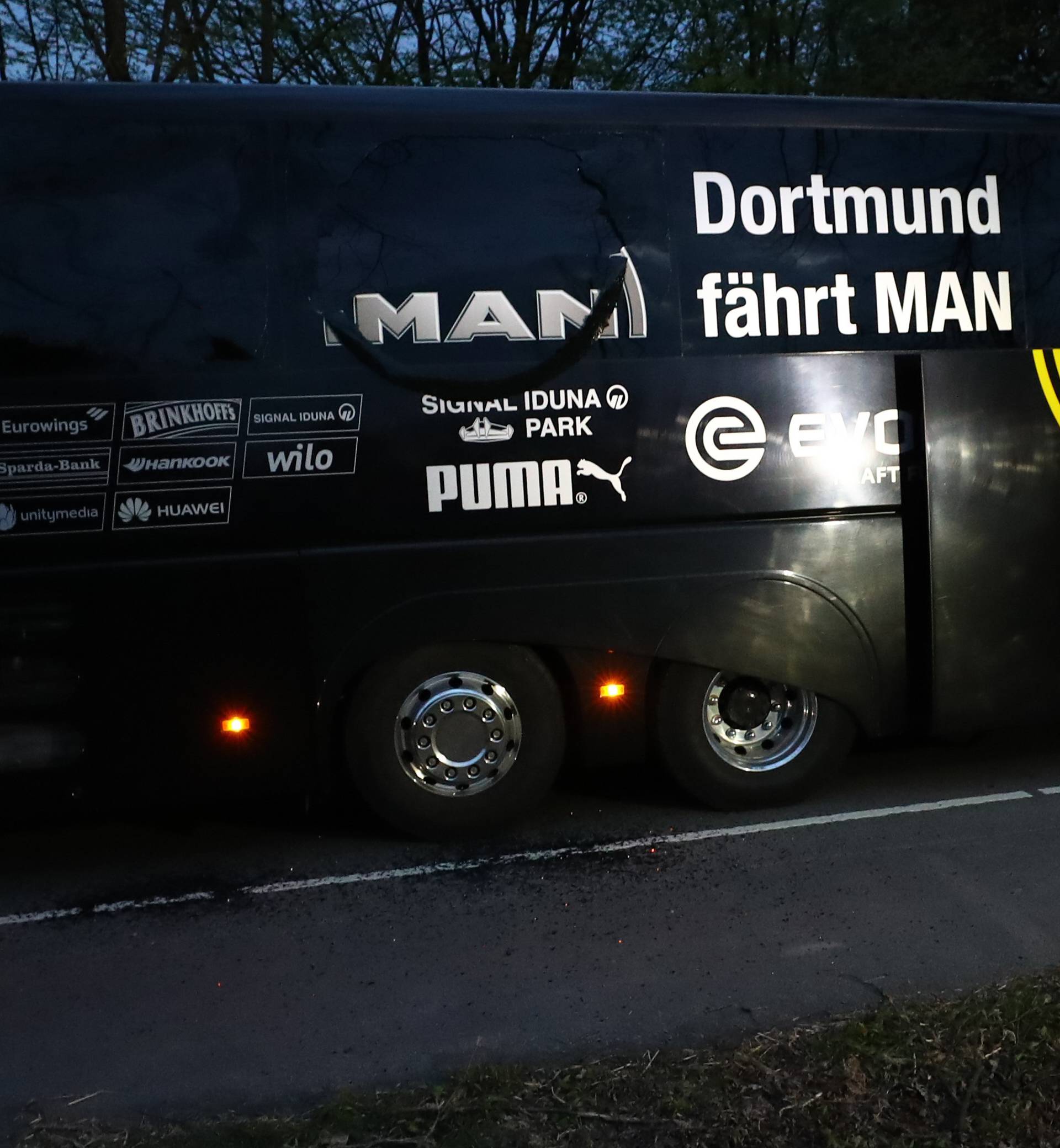 The Borussia Dortmund team bus is seen after an explosion near their hotel before the game