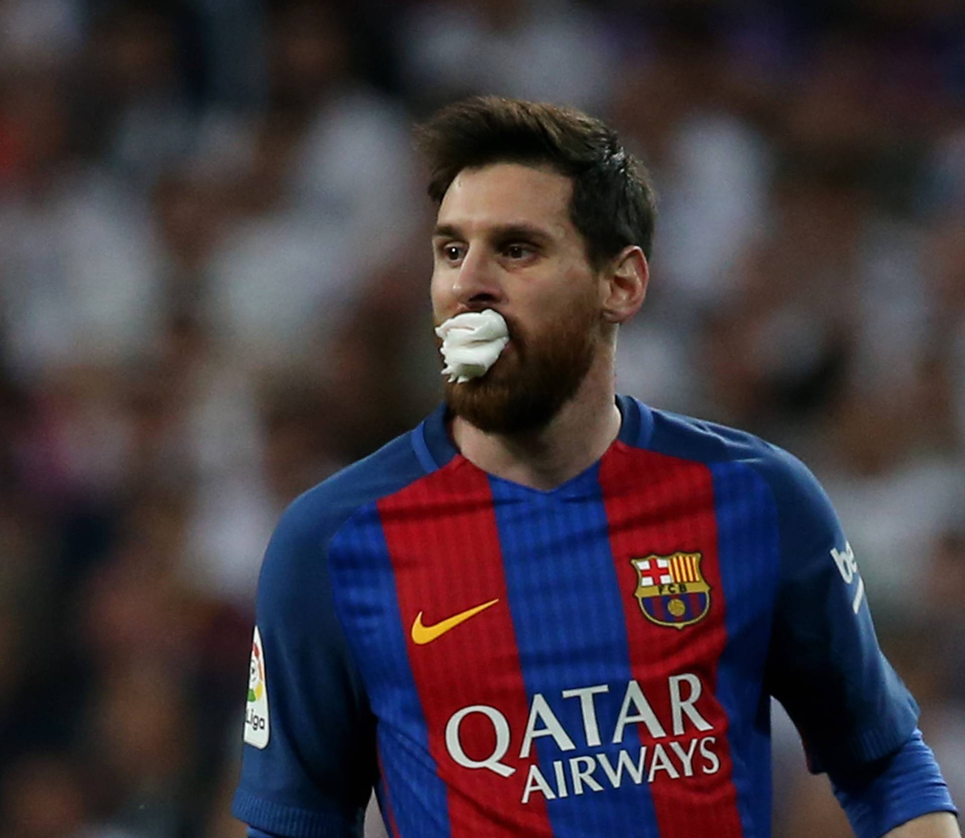 Barcelona's Lionel Messi after receiving treatment