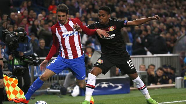 Atletico Madrid's Sime Vrsaljko in action with Bayer Leverkusen's Wendell