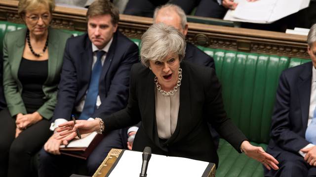 FILE PHOTO: Britain's Prime Minister Theresa May speaks during a debate on her Brexit 'plan B' in Parliament