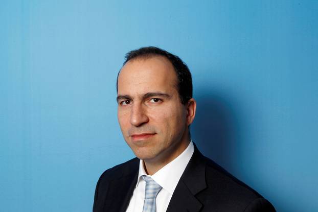 FILE PHOTO - Expedia CEO Dara Khosrowshahi poses for a portrait during the 2010 Reuters Travel and Leisure Summit in New York