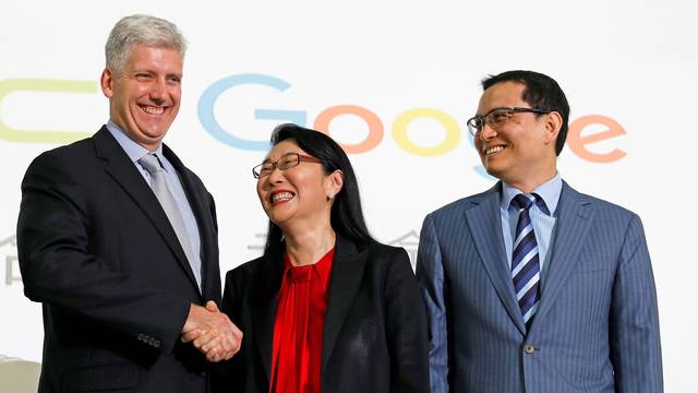 Google hardware executive Rick Osterloh shakes hand with HTC CEO Cher Wang during a news conference to announce Google to acquire HTC's Pixel smartphone division, in Taipei