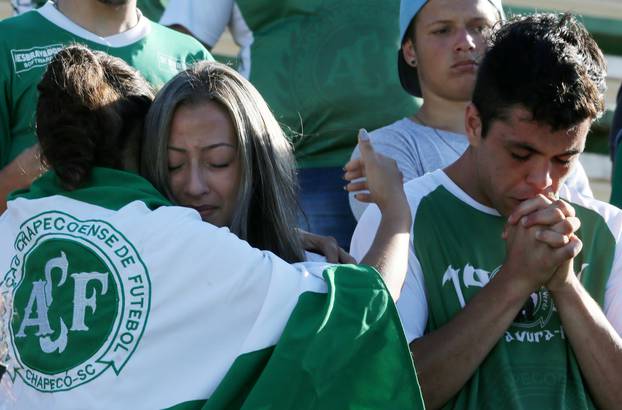 Fans of Chapecoense soccer team react at the Arena Conda stadium in Chapeco