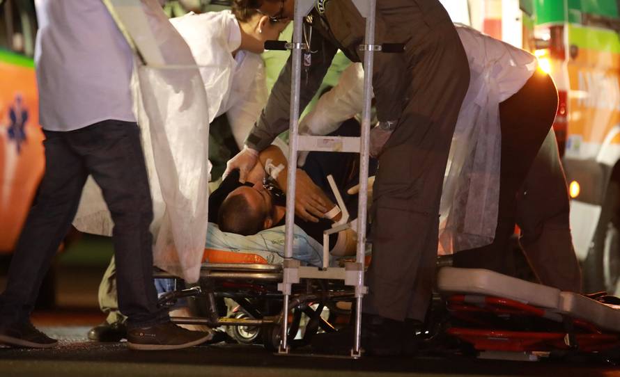Ruschel, player of Brazilian soccer team Chapecoense, lies on a stretcher as he arrives to Brazil, after he survived a plane crash with his teammates aboard, in Chapeco