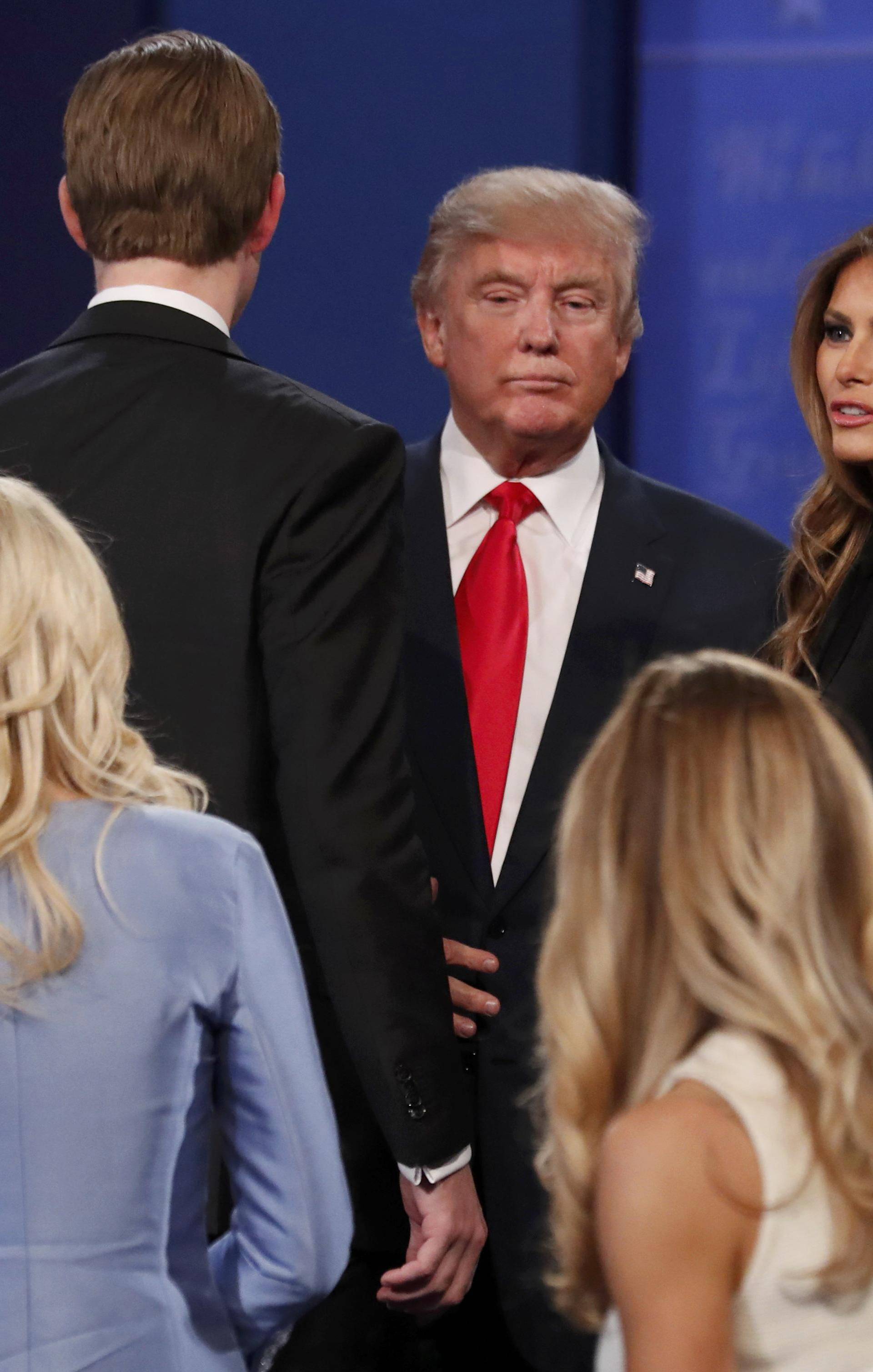 Republican U.S. presidential nominee Donald Trump, his daughter Ivanka, son Eric and wife Melania speak after the third and final 2016 presidential campaign debate at UNLV in Las Vegas