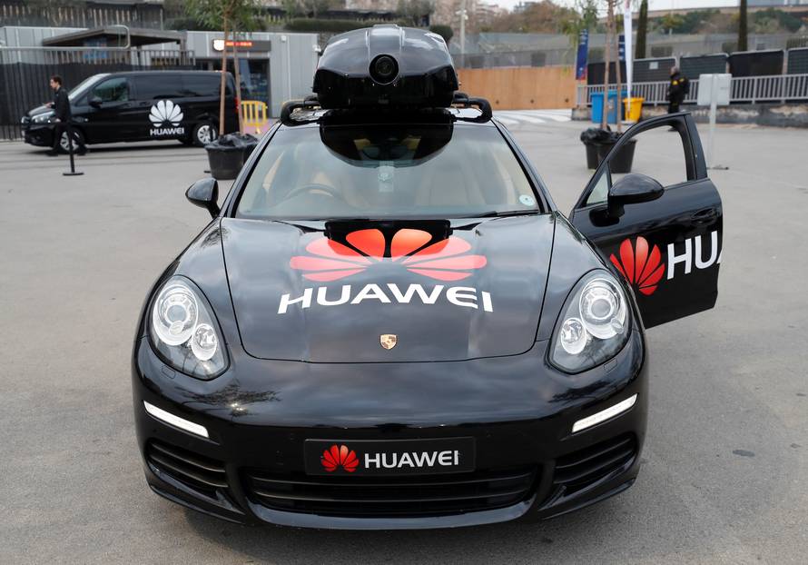 A driverless car controlled by a Huawei Mate 10 Pro mobile is pictured during the Mobile World Congress in Barcelona