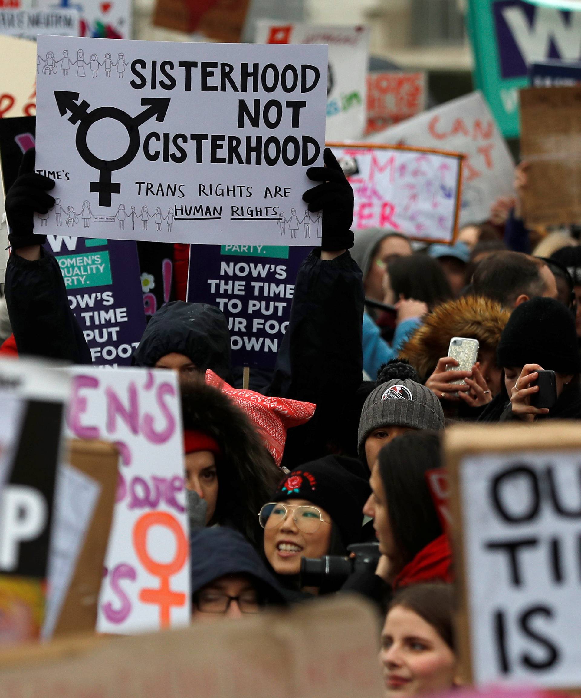 Demonstrators shout at a Times Up protest supporting womens rights in London