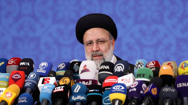 Iran's President-elect Ebrahim Raisi speaks during a news conference in Tehran