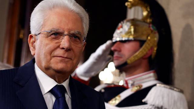 Italian President Sergio Mattarella leaves after speaking to the media during the second day of consultations at the Quirinal Palace in Rome