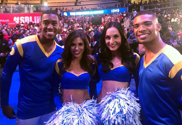 Los Angeles Rams cheerleader Napoleon Jinnies fields questions from reporters at Super Bowl Opening Night at State Farm Arena in Atlanta