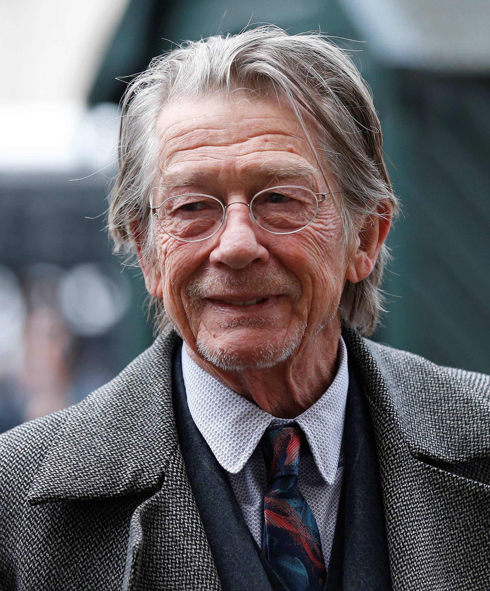 FILE PHOTO: Actor John Hurt arrives for a memorial service for actor and director Richard Attenborough at Westminster Abbey in London
