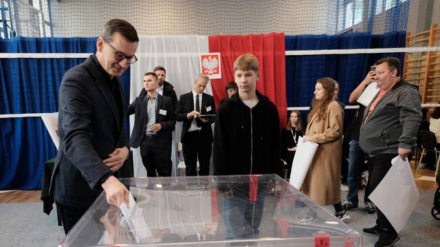 Polish PM Morawiecki votes in parliamentary election in Warsaw