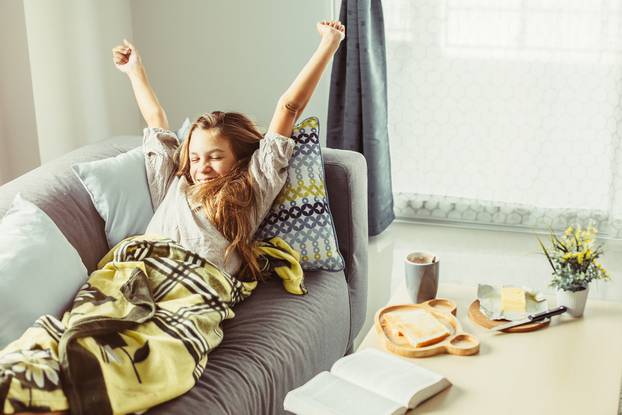 10,Years,Old,Pre,Teen,Girl,Wrapped,In,Blanket,Stretching