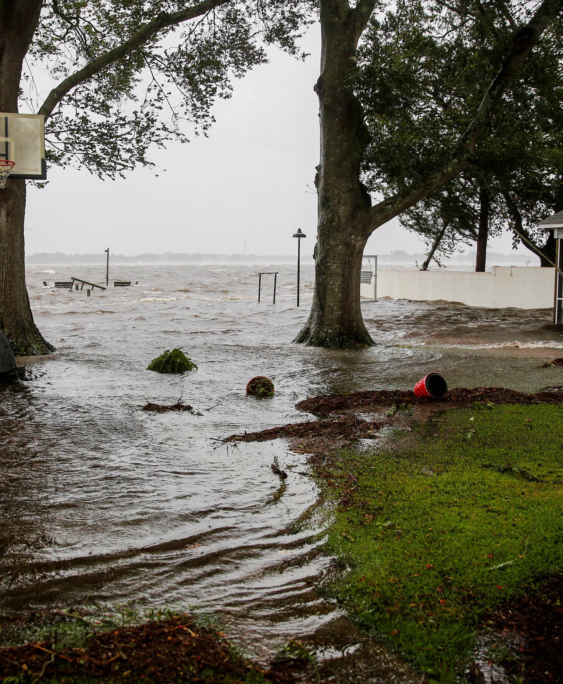 FILE PHOTO: Water from Neuse River starts flooding houses as the Hurricane Florence comes ashore in New Bern North Carolina