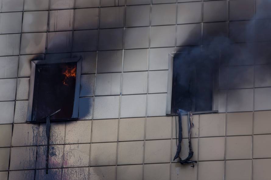 Smoke and flames engulf a shopping mall in Kemerovo