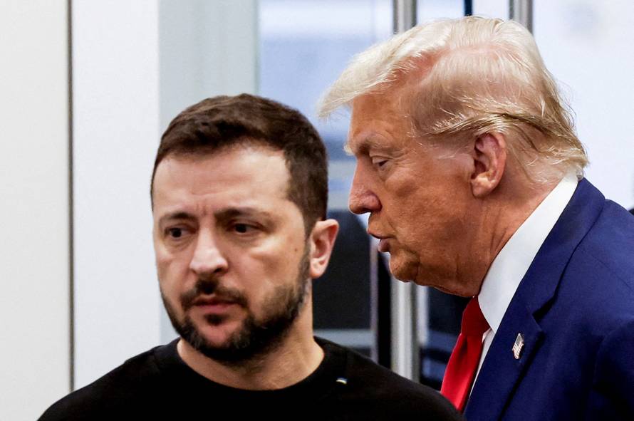FILE PHOTO: Republican presidential nominee and former U.S. President Donald Trump and Ukraine's President Volodymyr Zelenskiy meet in New York