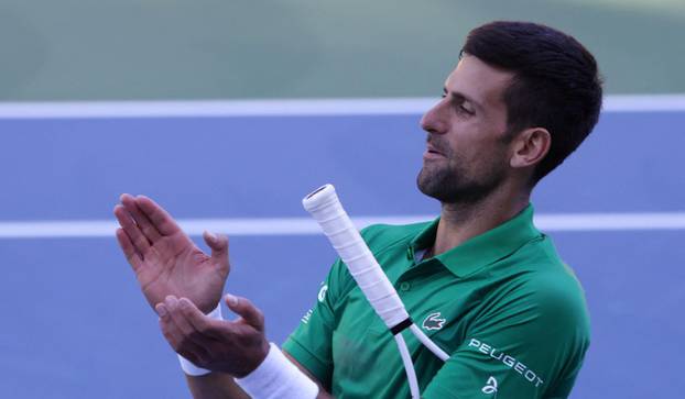 Serbian tennis player Novak Djokovic performs during the opening of a regional tennis centre that will prepare top tennis players for major tournaments, in Visoko