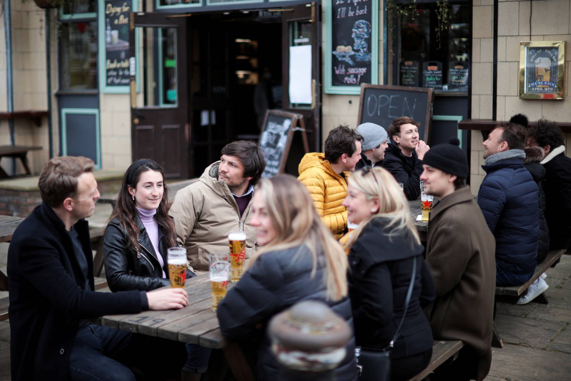 Pubs reopen as COVID-19 restrictions ease, in London