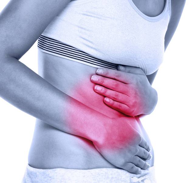Stomach abdomen pain - woman having abdominal pain